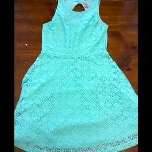 Teal kids dress. With an open back.. been worn a few times